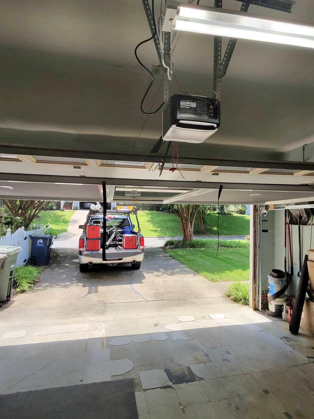 TNGD truck in driveway during opener installation