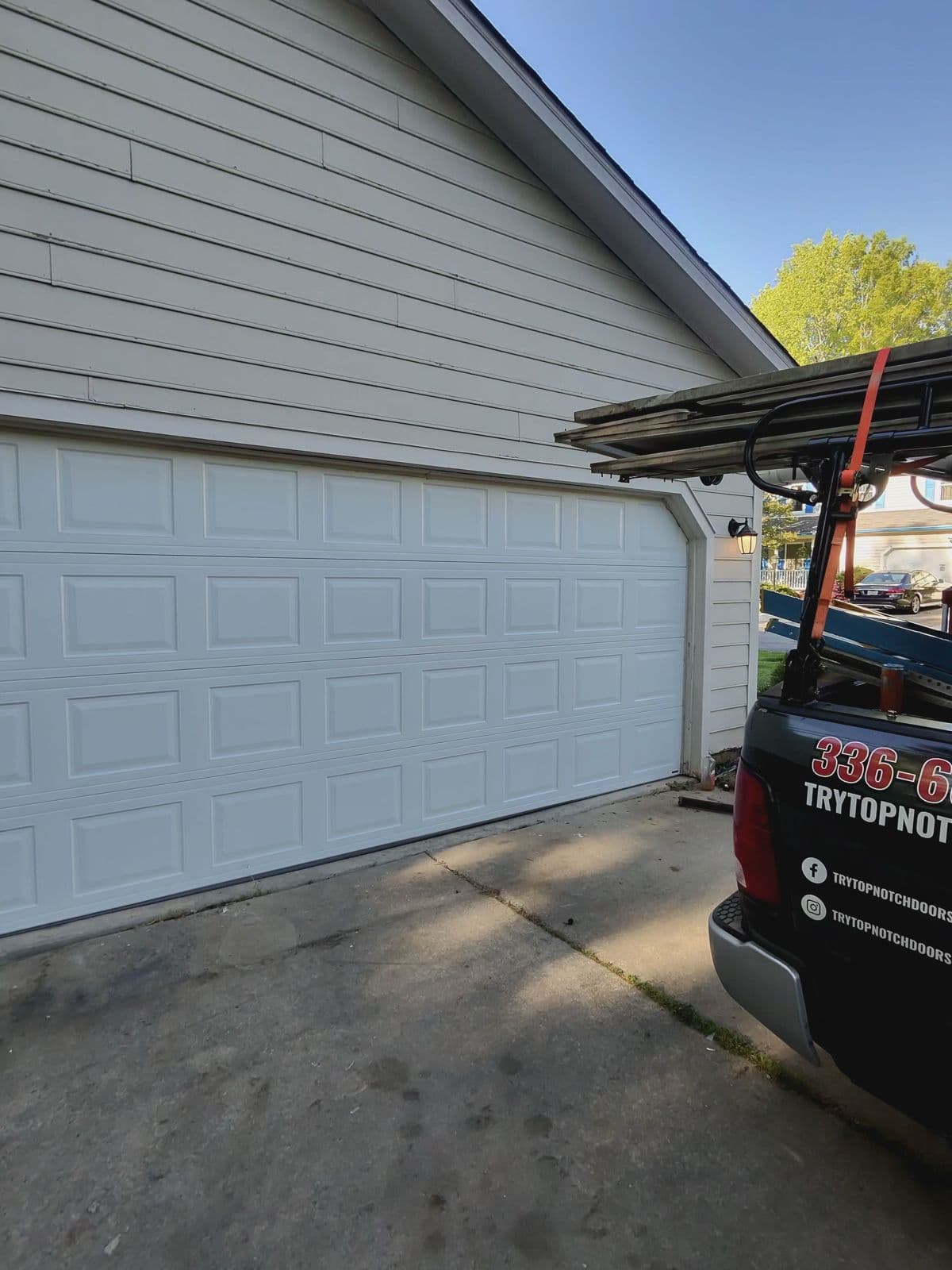 New garage door with TNGD truck in Greensboro NC