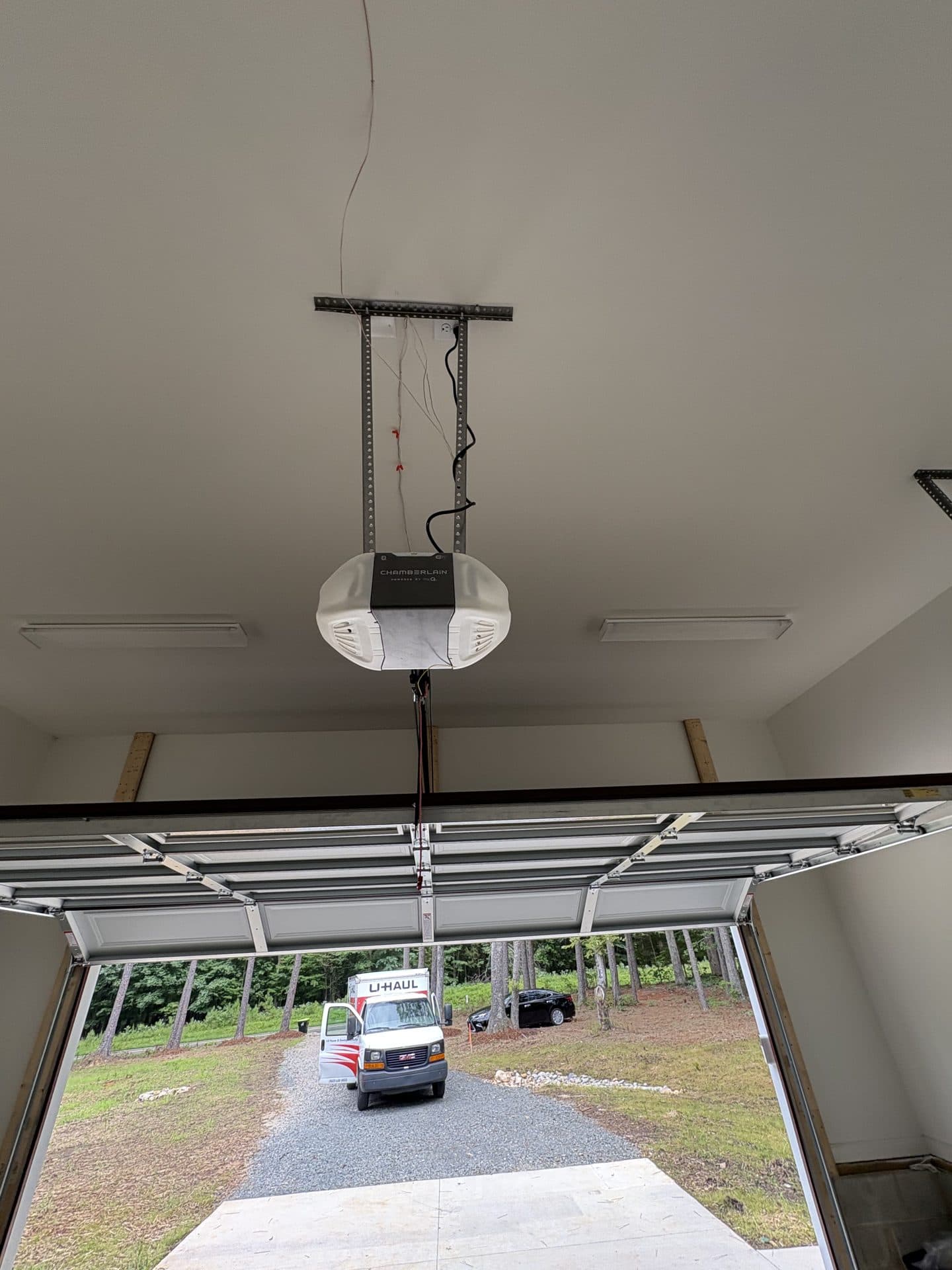 Chamberlain ceiling-mount opener installed in residential garage