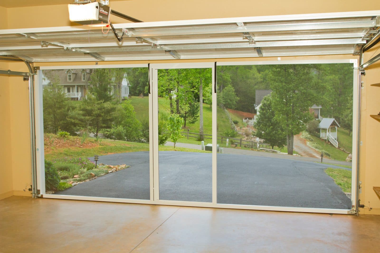 Open garage with Lifestyle Screen showing clear outdoor view
