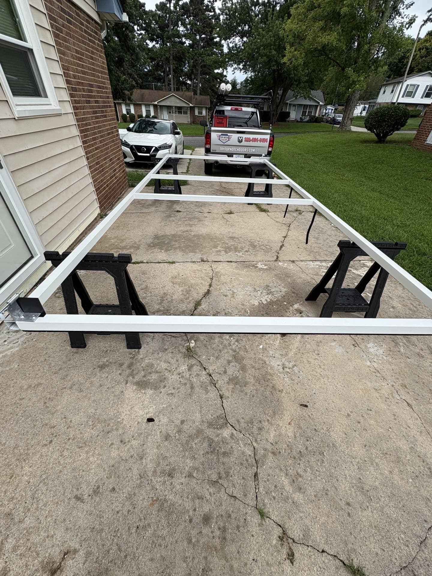 Screen door frame assembly with TNGD truck