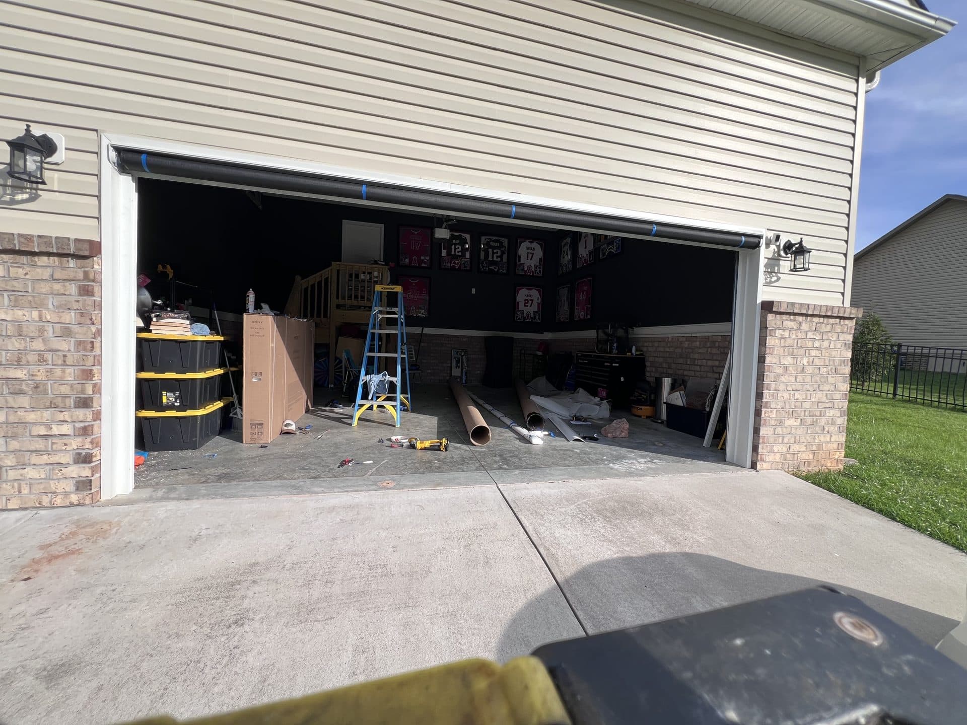 Screen door installation in progress