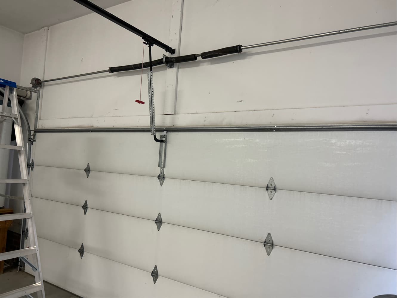 Broken garage door spring replacement in NC