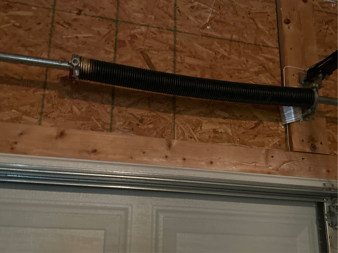 New torsion spring installed after emergency repair in Greensboro NC